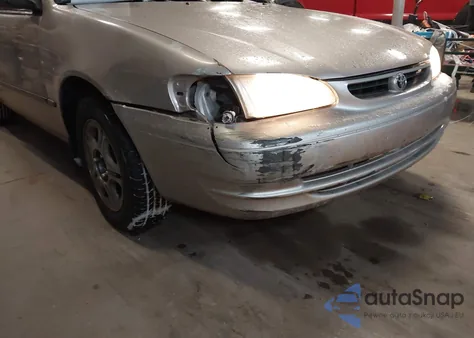 2000 Toyota Corolla Ce из США, поврежденный, VIN 1NXBR12E6YZ350455